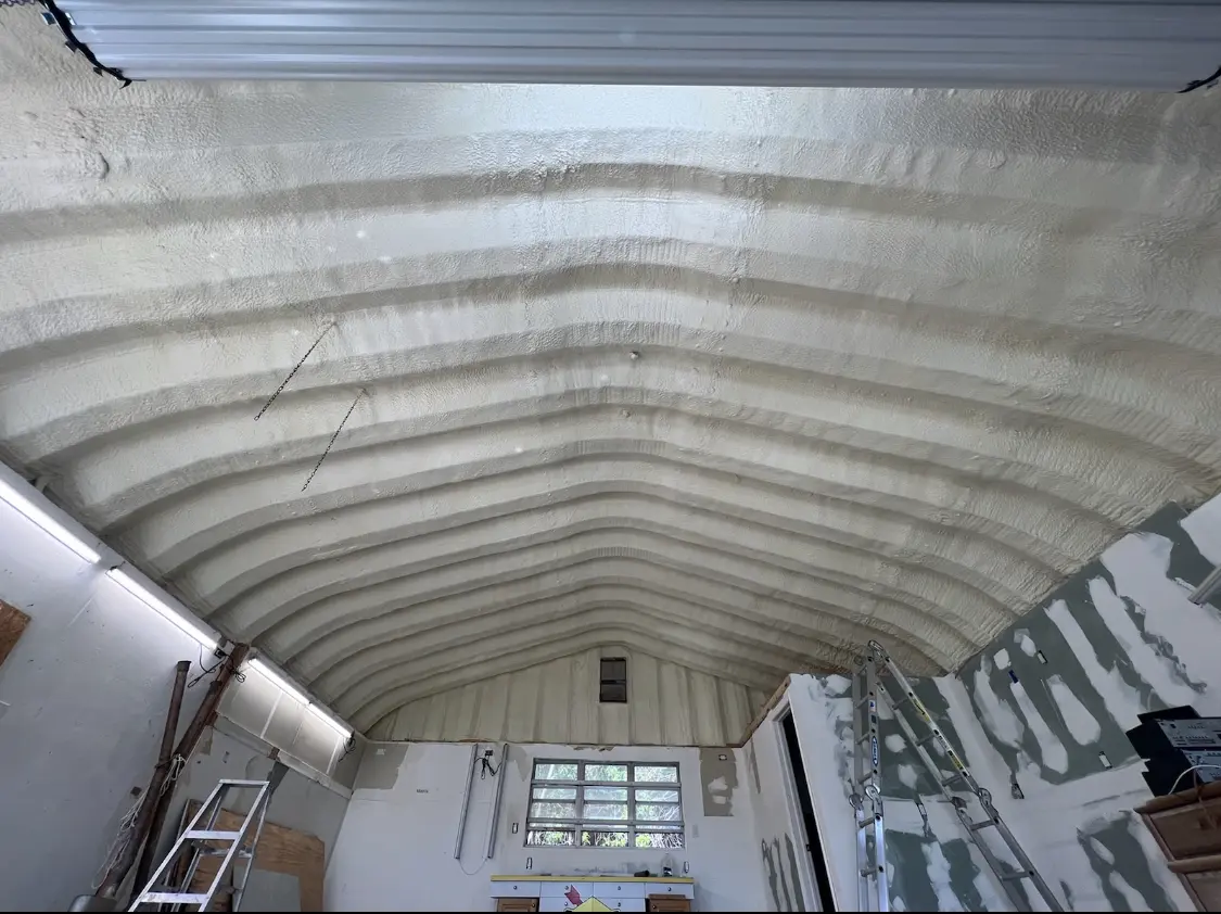 Spray polyurethane foam applied to the underside of a metal roof deck in Gresham Park